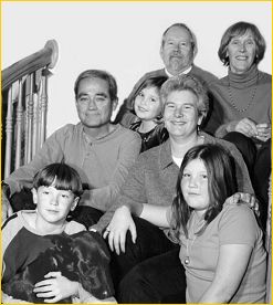 Pam Gunnell surrounded by her children, husband, parents, and loyal friend, Skipper.